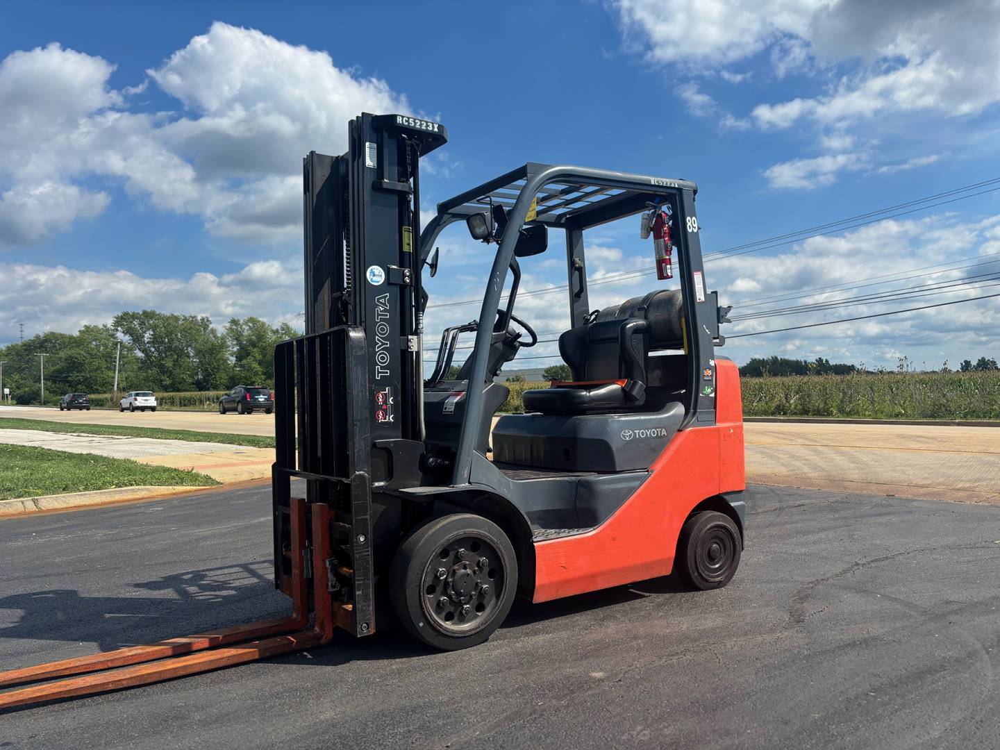 Toyota forklift parked outdoors on pavement
