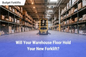 A wide-angle view of a modern warehouse interior featuring a yellow forklift parked in a storage aisle on a textured concrete floor.
